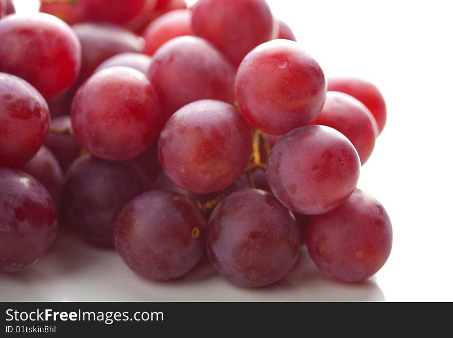 Ripe grapes isolated over white