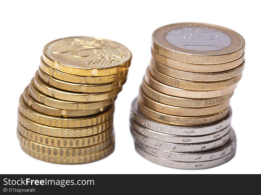 Two stacks of coins isolated over white