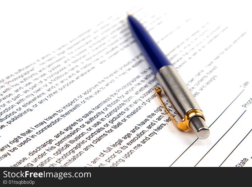 The pen on the document. The pen on the document