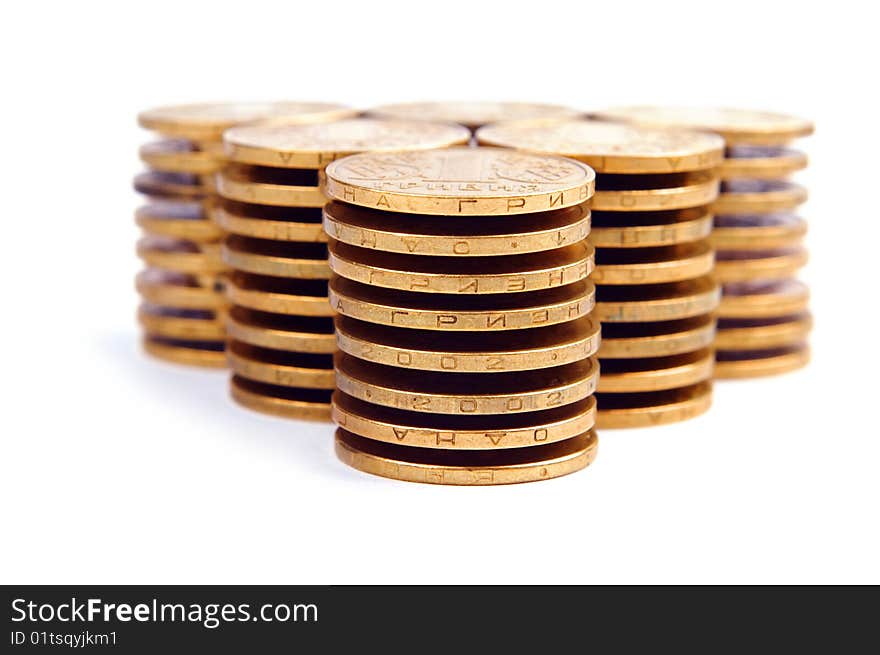 Triangle from the coins isolated on white. Triangle from the coins isolated on white