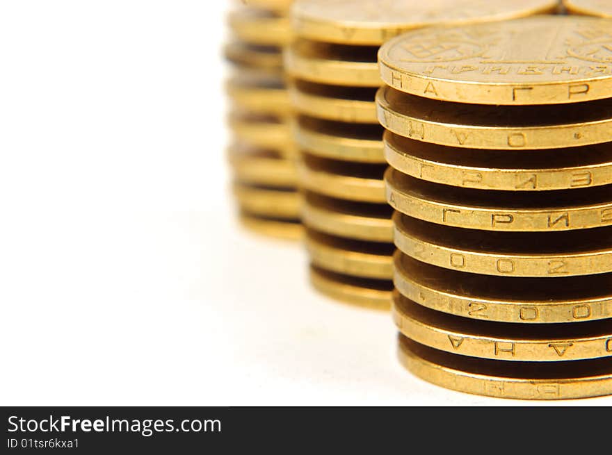 The stack of coins isolated on white