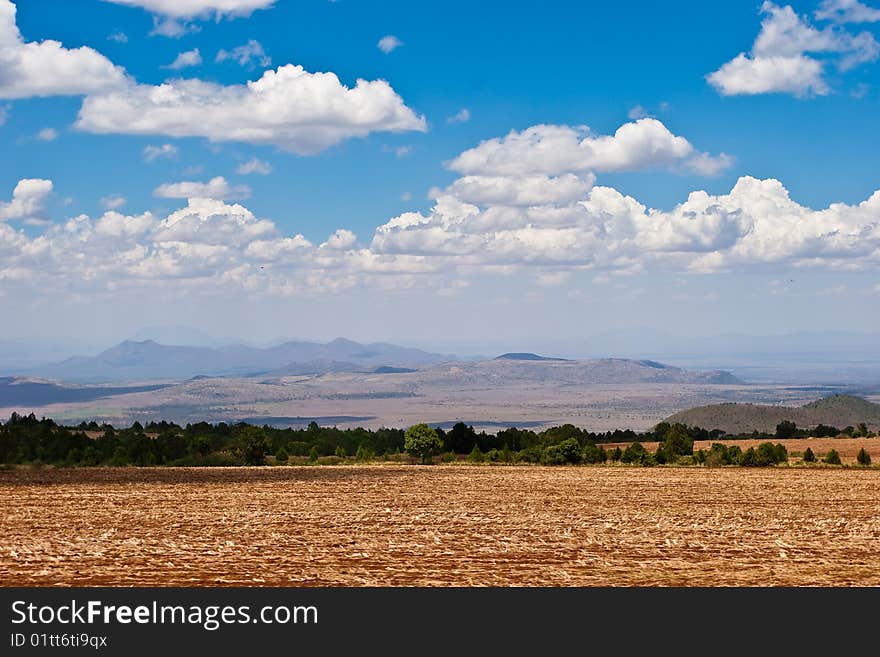 Landscape of farmland and hills