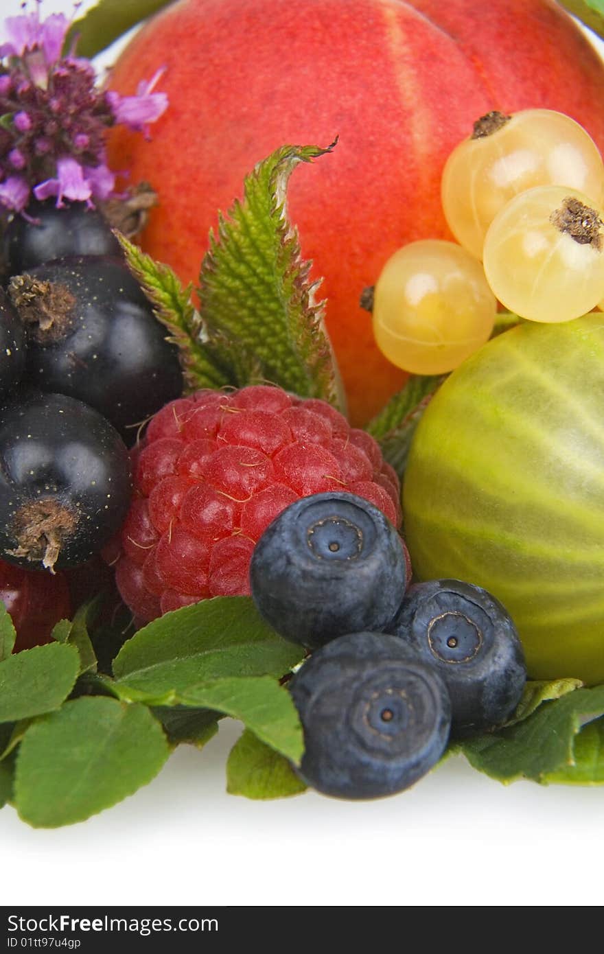 Variety of fresh colorful fruits.On white. Variety of fresh colorful fruits.On white.