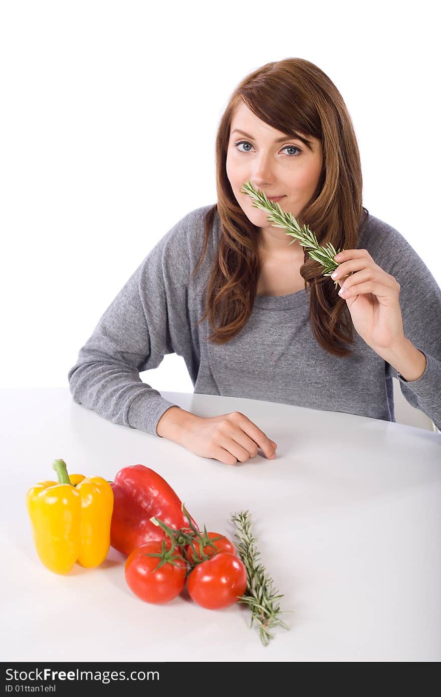 Woman smell herb in a modern kitchen