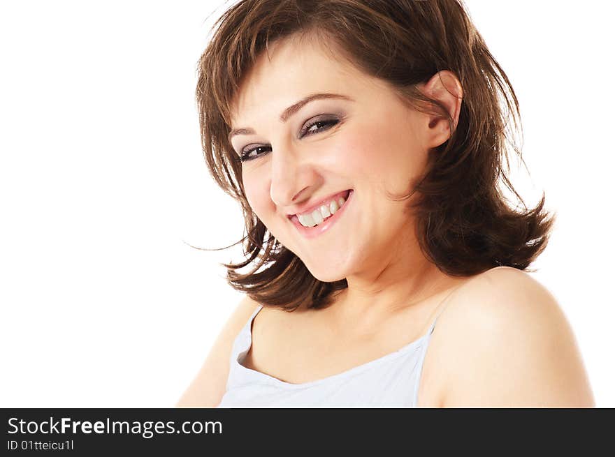 Laughing young woman with curly hair