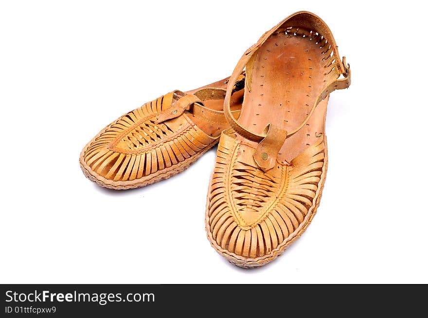 Hand crafted leather footwear isolated on white background.