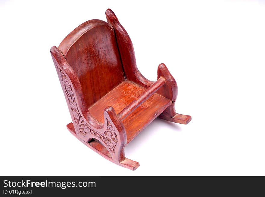 Small baby wooden chair isolated on white background.