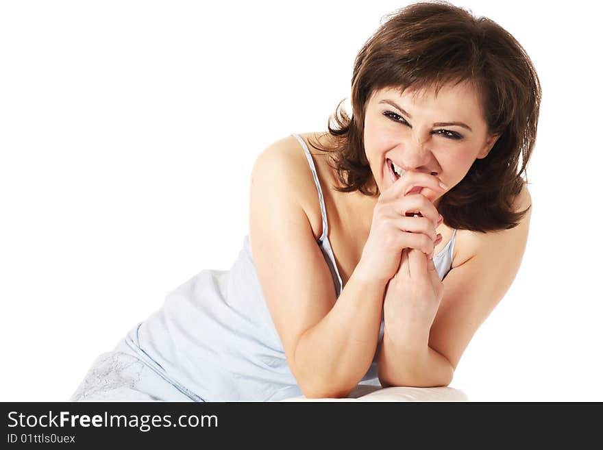 Laughing young woman with brown curly hair