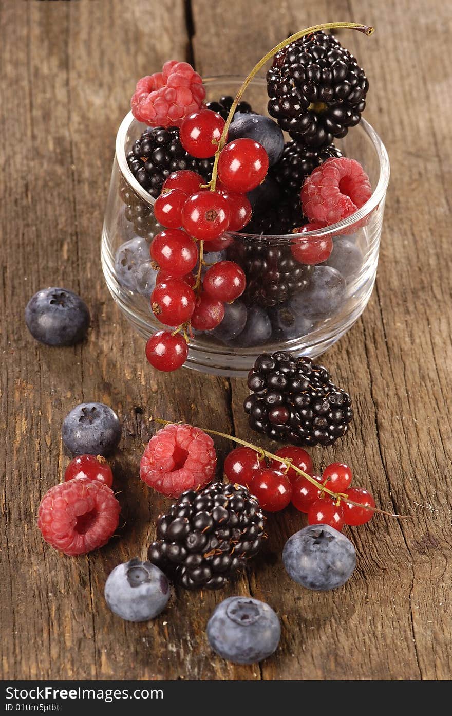 Fresh berries on a wooden table