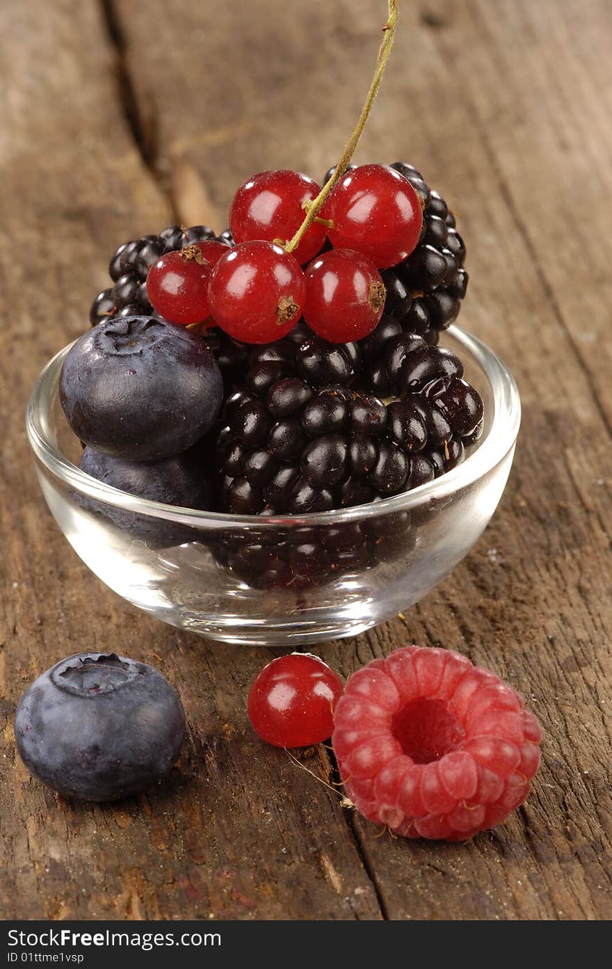 Fresh berries on a wooden table