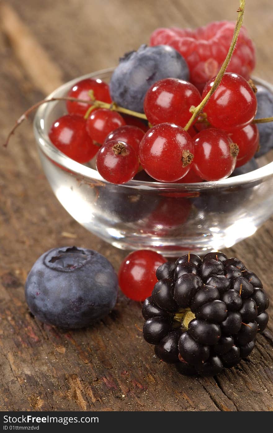 Fresh berries on a wooden table