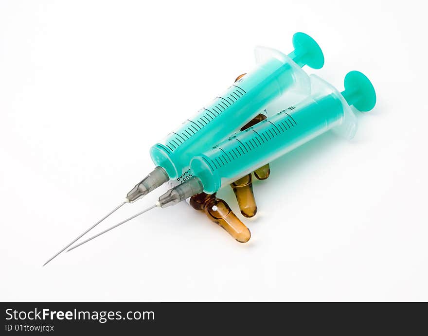 Two disposable syringe in ampoules with medicine. Two disposable syringe in ampoules with medicine