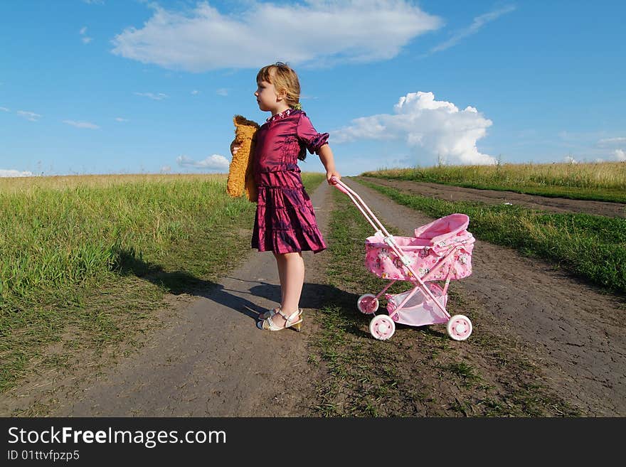 The lonely girl on a farmer field