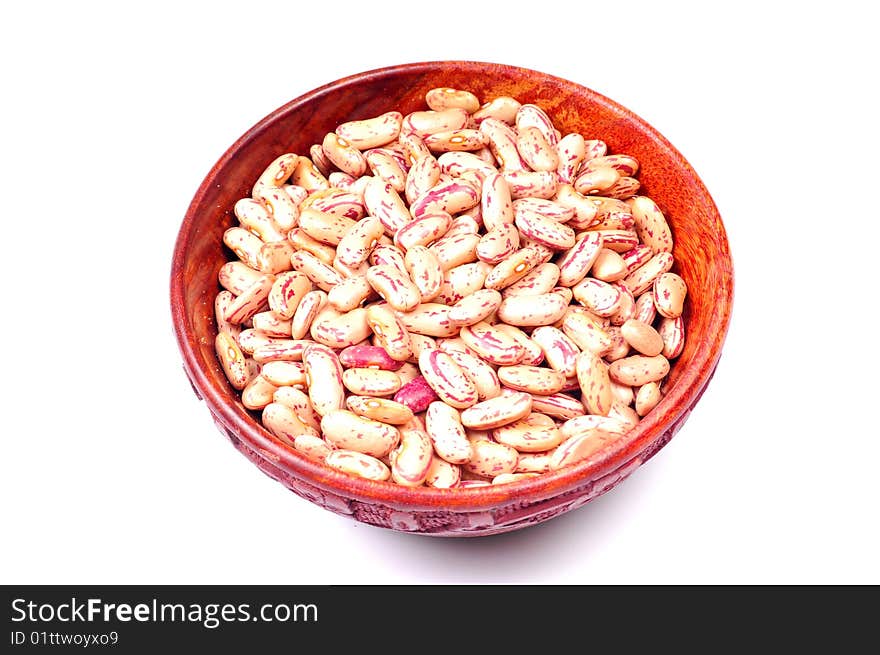 Kidney beans in wooden bowl.