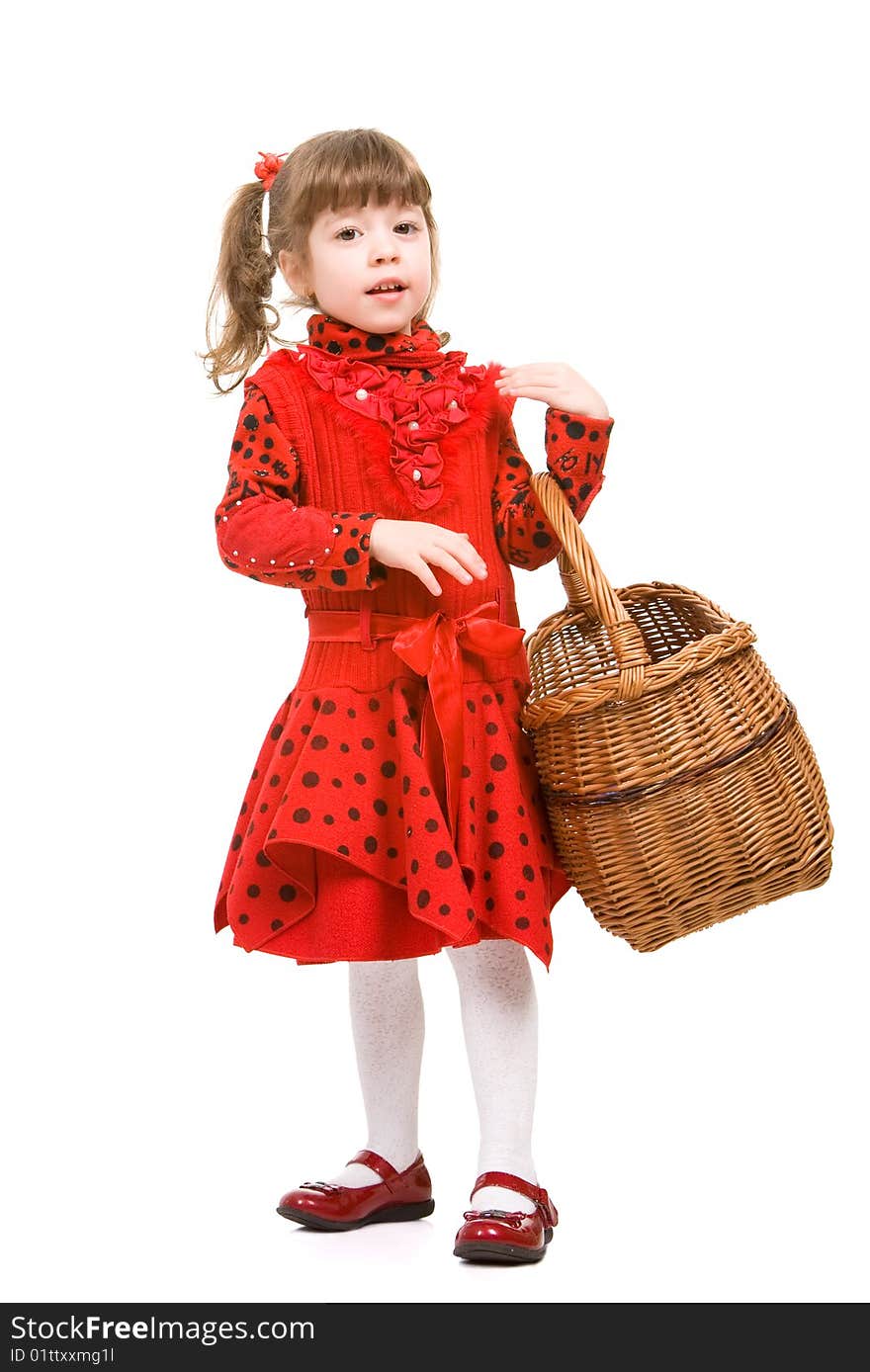 Beautiful little girl in red dress holding basket, isolated on white