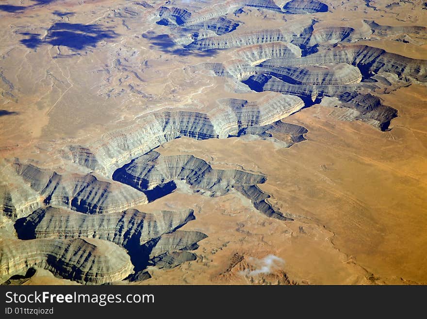 Sinuous river with high deep cliffs