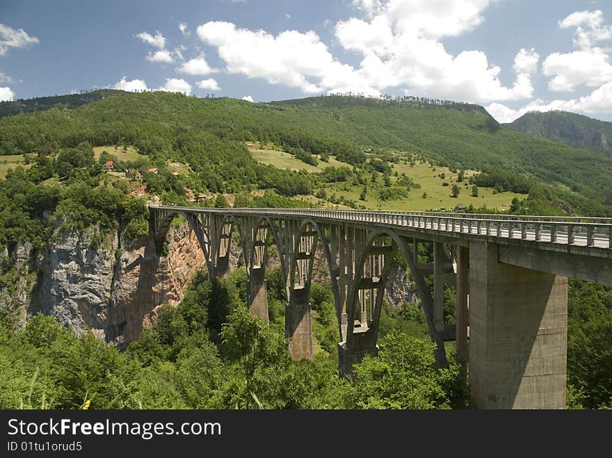 Arch bridge over the river Tara in Montenegro - the highest bridge in Europe. Arch bridge over the river Tara in Montenegro - the highest bridge in Europe.