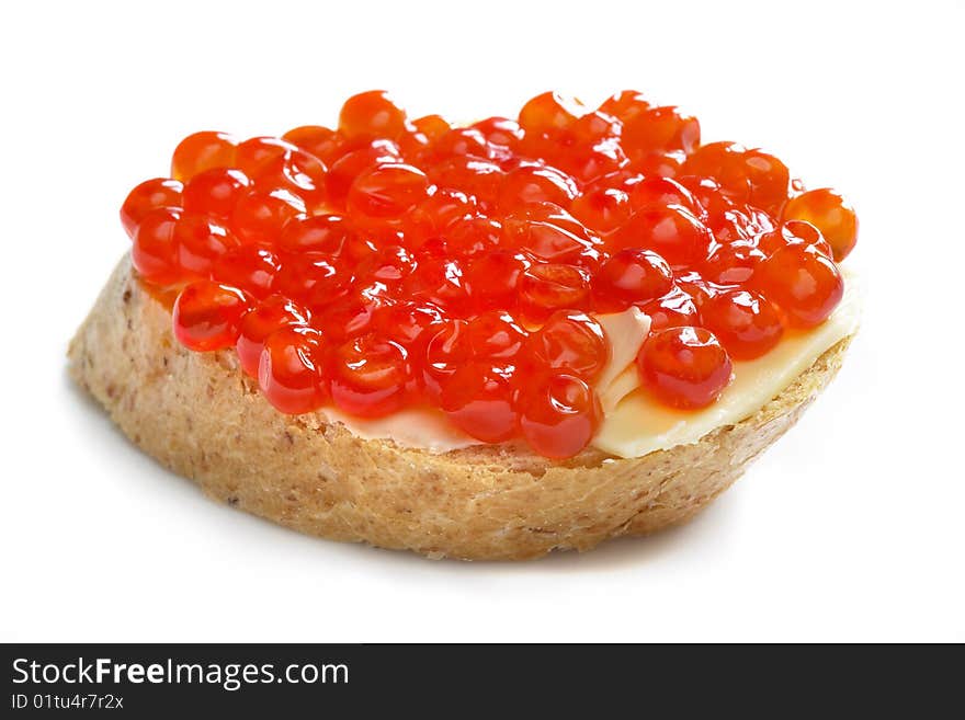 Red caviar with bread and butter isolated over white background. Red caviar with bread and butter isolated over white background