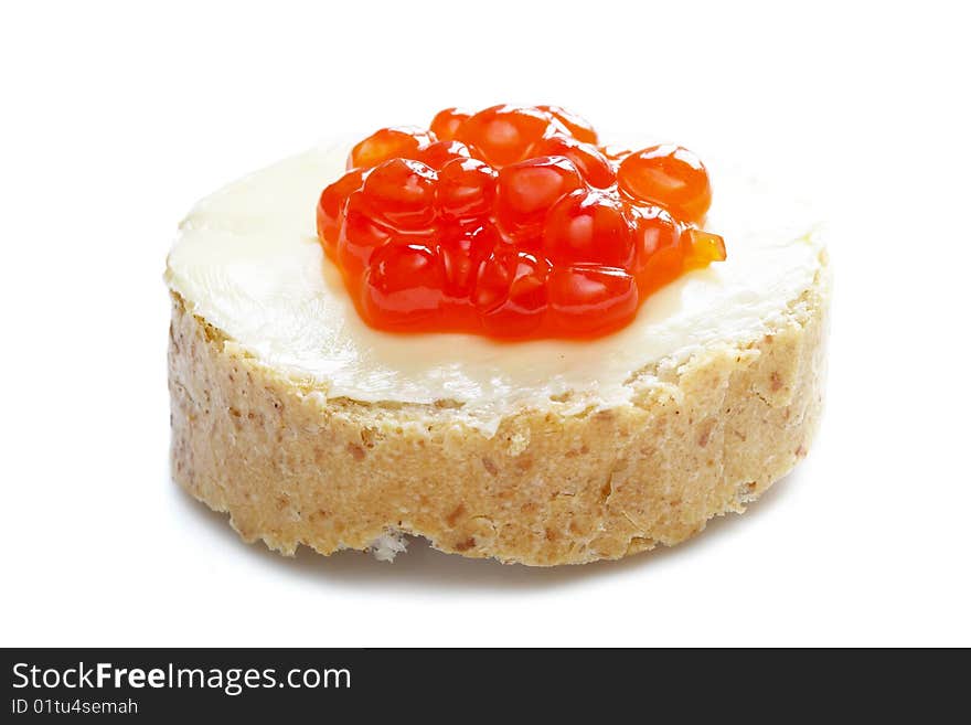 Red caviar with bread and butter isolated over white background. Red caviar with bread and butter isolated over white background