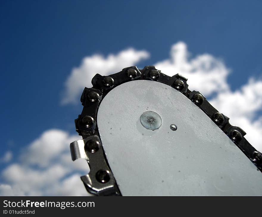 Chain saw and the sky