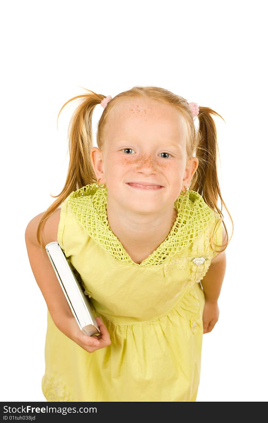 Smiling girl holding a book isolated on white. Smiling girl holding a book isolated on white