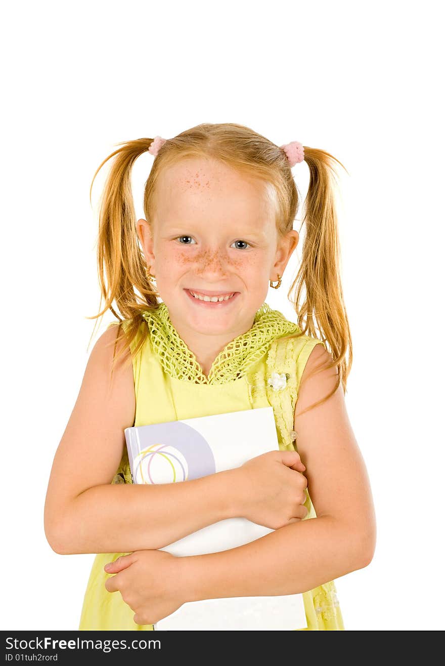 Smiling girl holding a book. Smiling girl holding a book