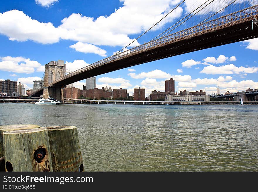 View of Manhattan and Brooklyn bridge on a beautiful summer day. View of Manhattan and Brooklyn bridge on a beautiful summer day