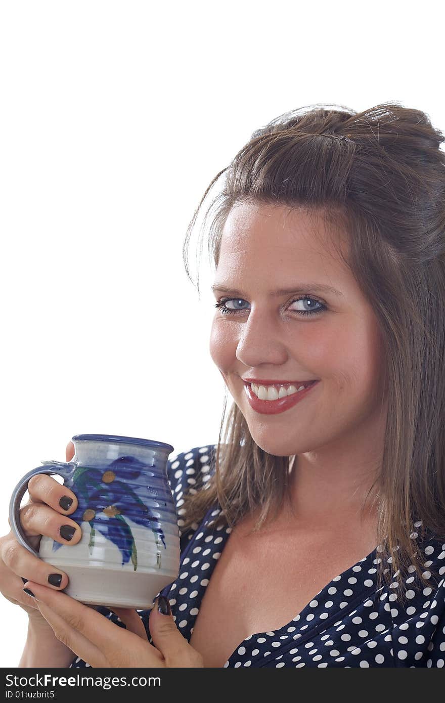 Young smiling business woman holds a coffee cup; close-up isolated on a white background. Young smiling business woman holds a coffee cup; close-up isolated on a white background.