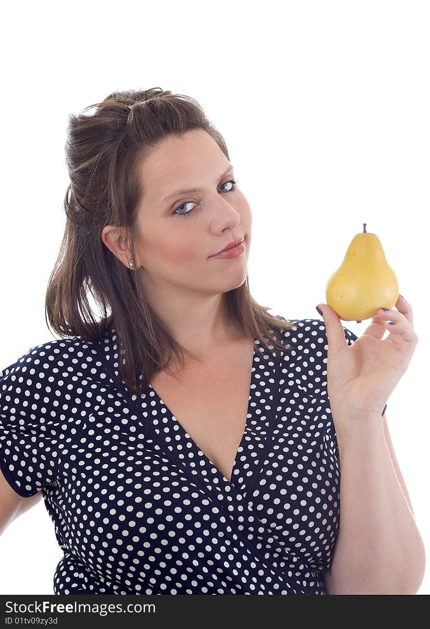 Young woman holds a pear; isolated