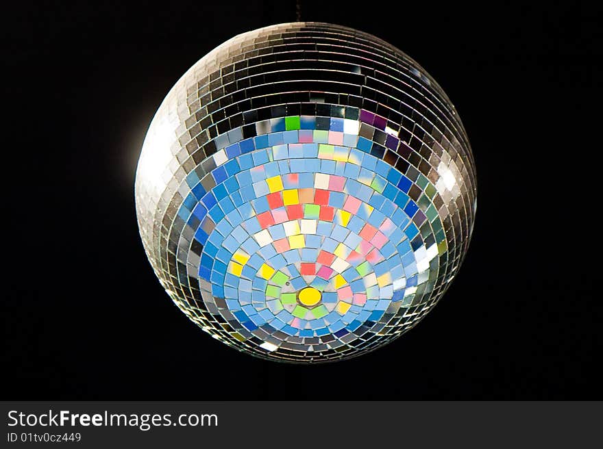 Large disco ball on black background