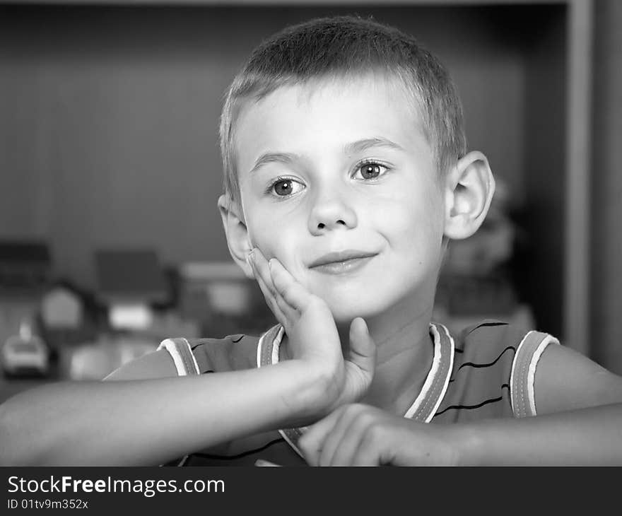 The boy of 7 years is engaged in a children's room. The boy of 7 years is engaged in a children's room