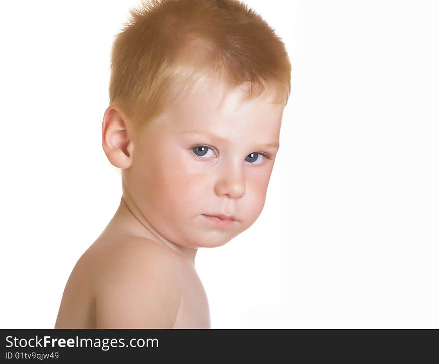 Portrait of the little boy with a thoughtful sight. Portrait of the little boy with a thoughtful sight