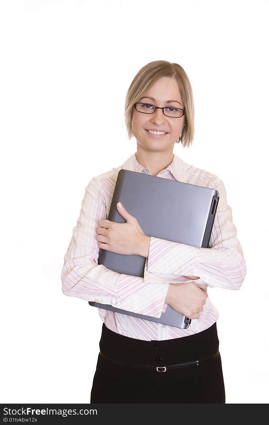 Young business woman folding a laptop. Young business woman folding a laptop