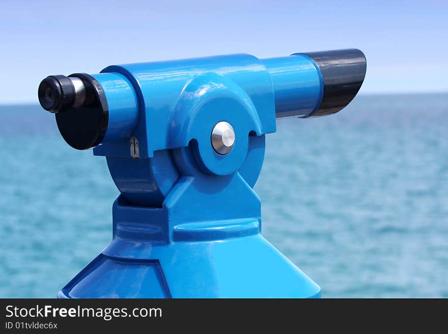 Coin operated binoculars on the pier in Costa Brava, Spain