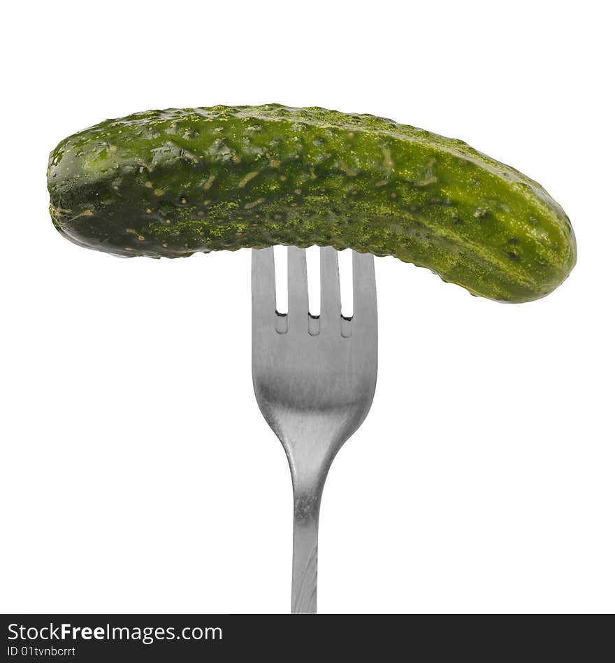 Fresh Green Cucumber On The Fork.