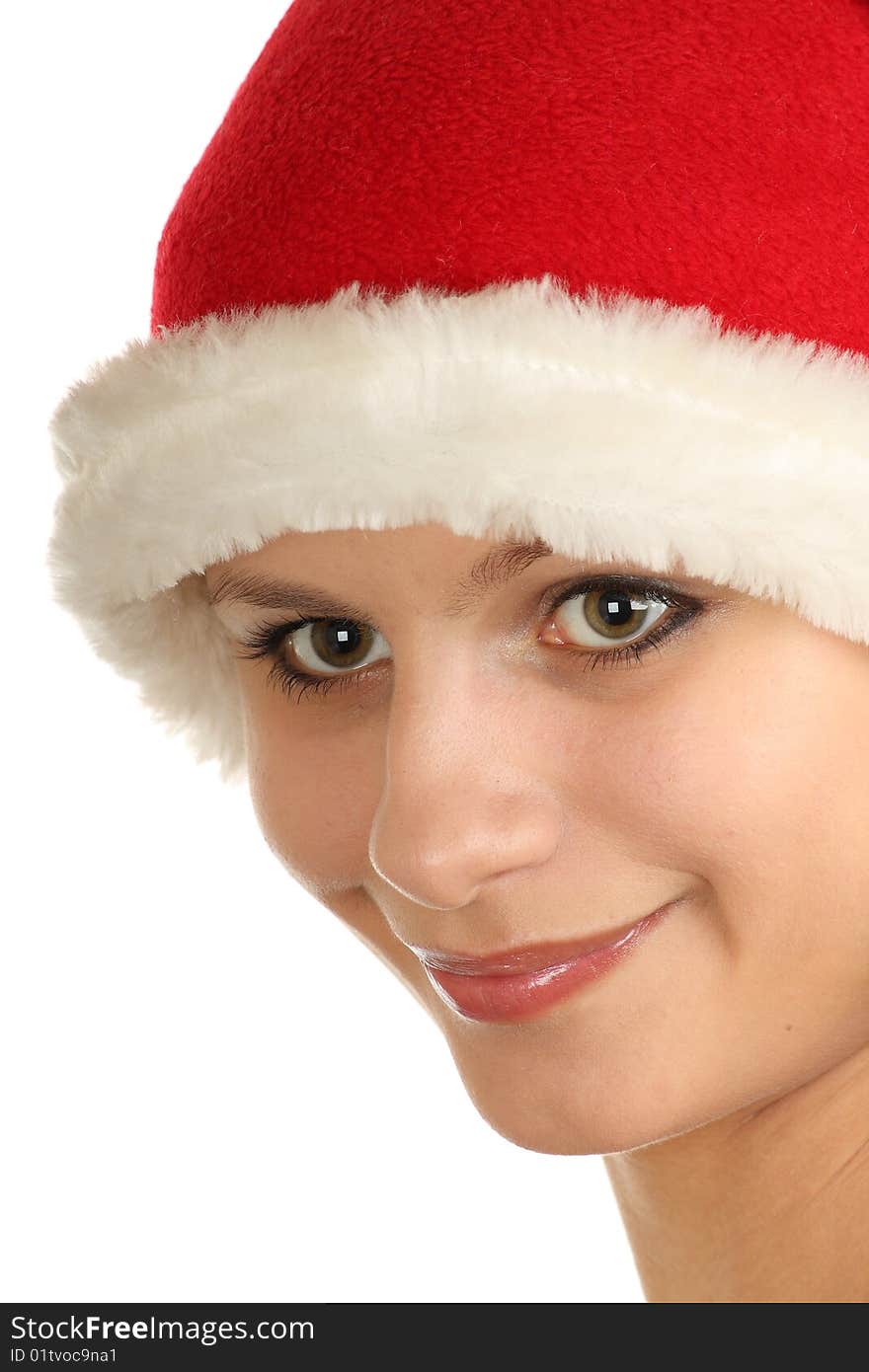 Pretty girl in santa hat over white