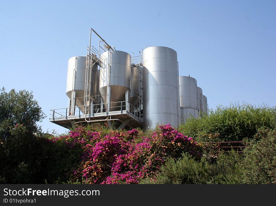 Vertical Outdoor Wine Fermentation Vats. Vertical Outdoor Wine Fermentation Vats