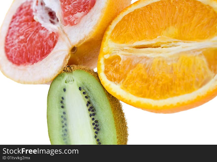 Fresh grapefruit, orange and kiwi isolated on white background. Fresh grapefruit, orange and kiwi isolated on white background