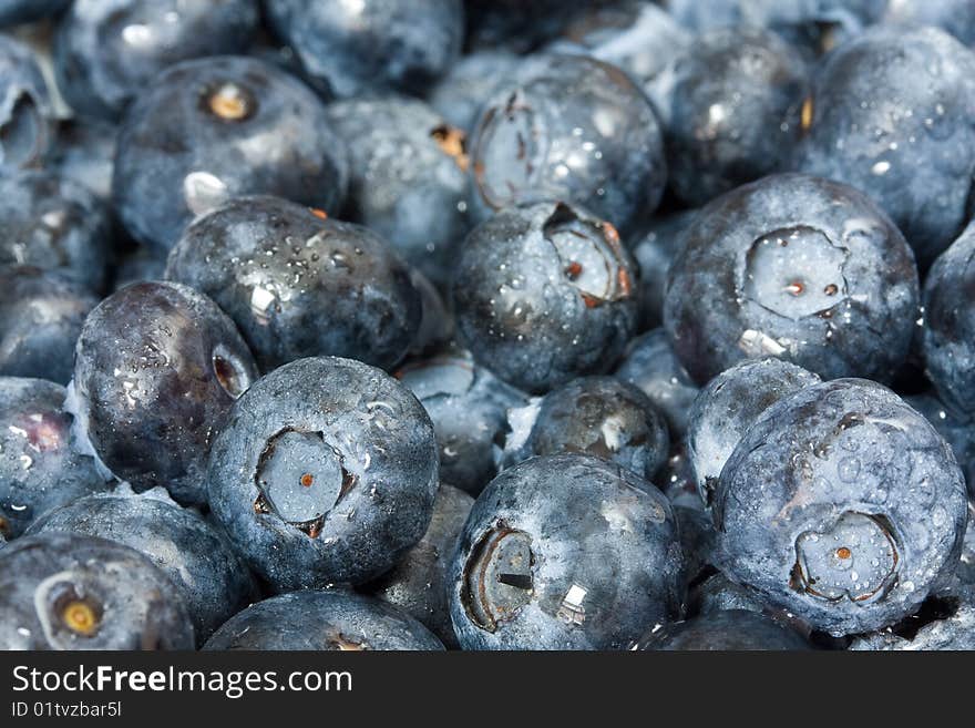 View of pile of fresh blueberries.