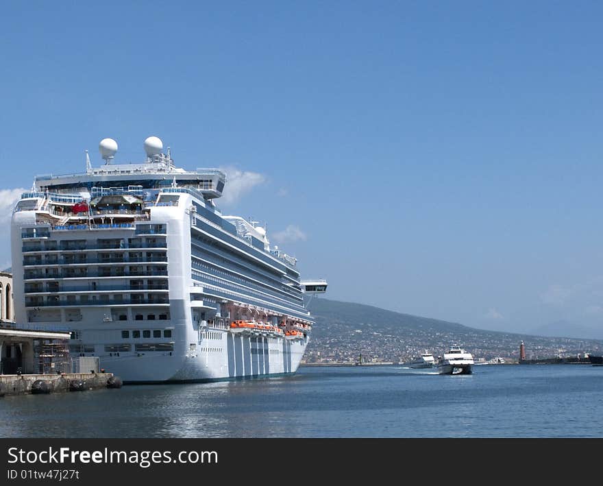 A large cruise ship in the harbour of naples. A large cruise ship in the harbour of naples