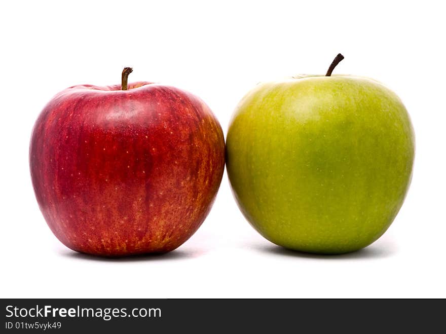 Red and green fresh apples on studio white