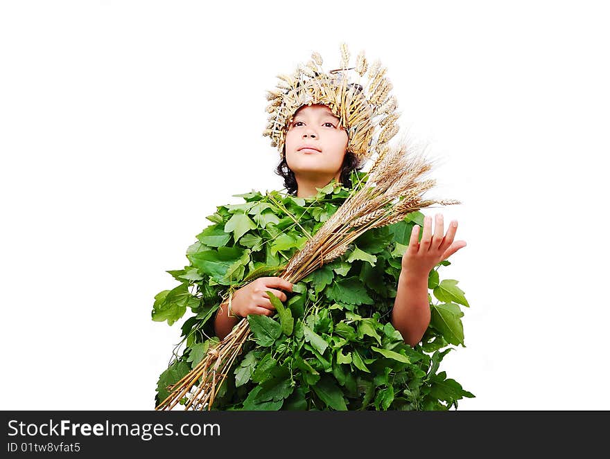 Nice little girl in leafs cloths with wheat hat