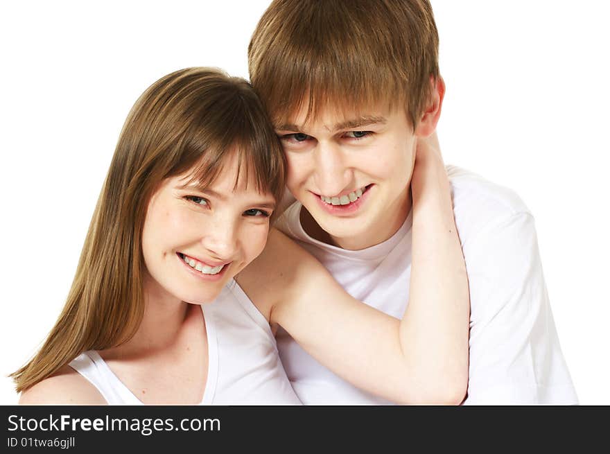 Laughing young couple on white background. Laughing young couple on white background