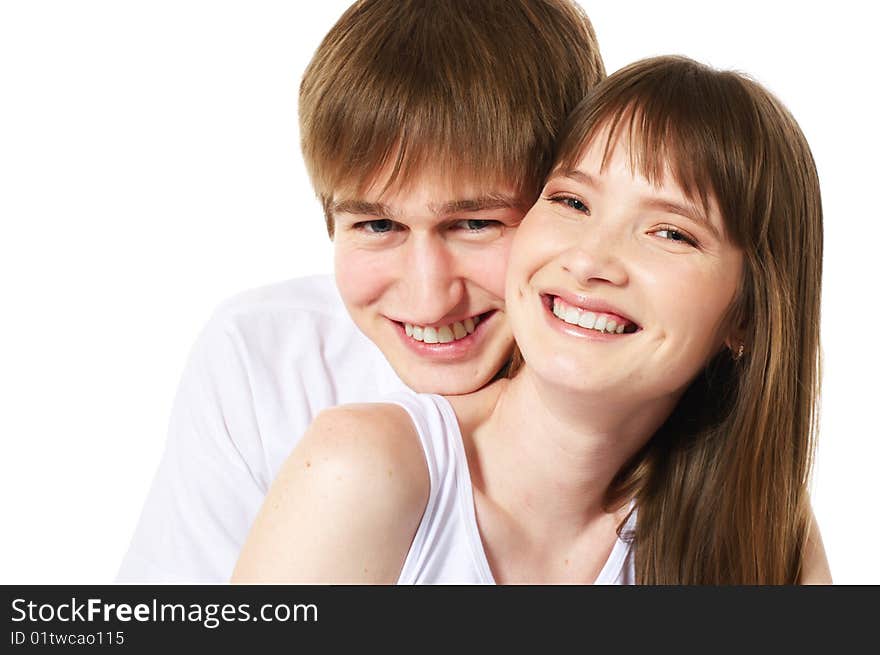 Laughing young couple on white background. Laughing young couple on white background