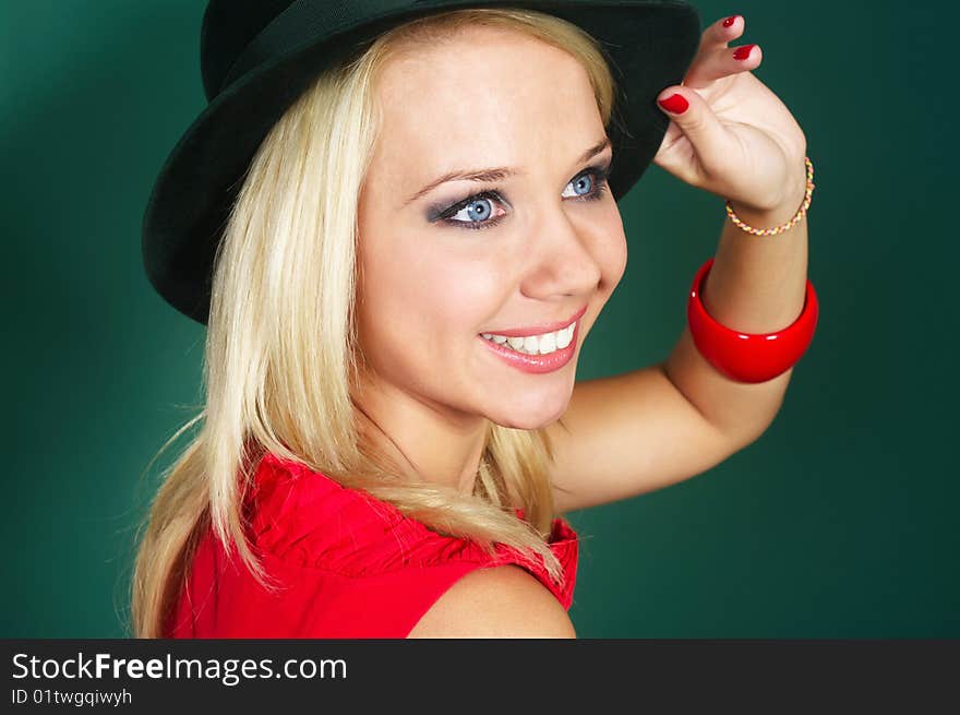 Young woman in green bonnet