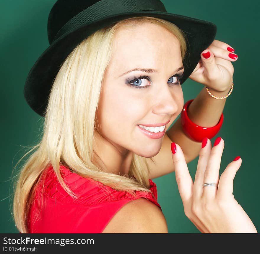 Young woman in green bonnet