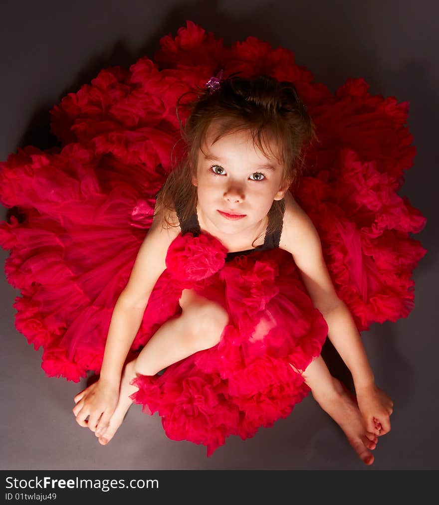 Cute little girl sitting on floor. Cute little girl sitting on floor