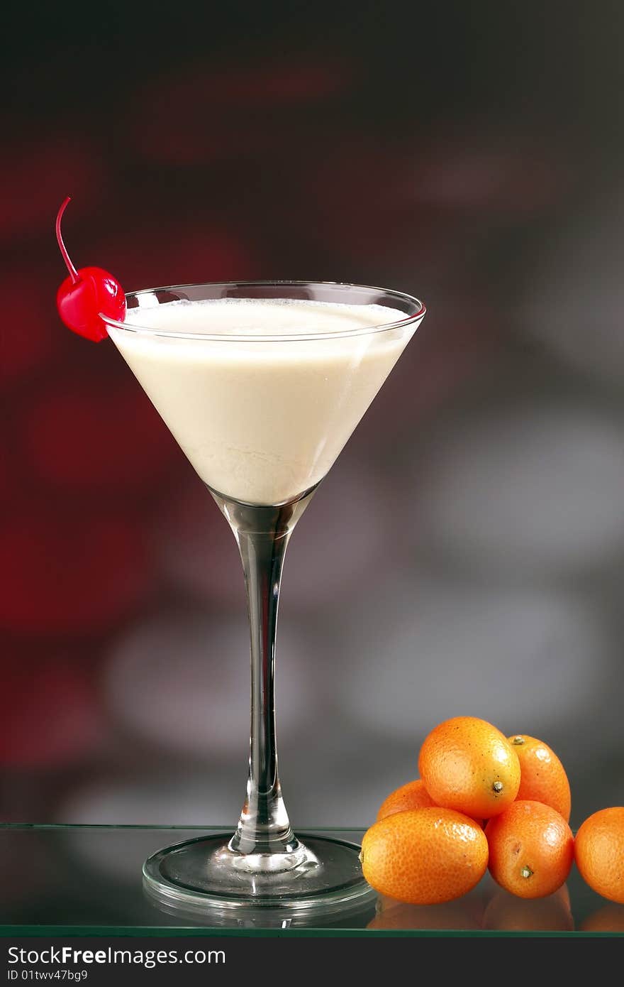 Glass of white cocktail with fruit. Glass of white cocktail with fruit