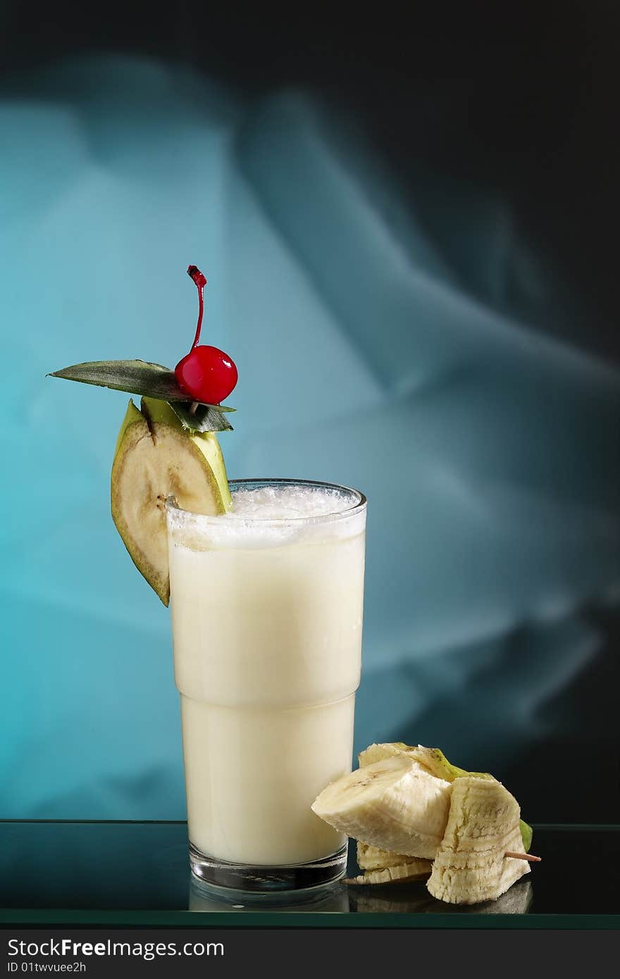 Coconut cocktail with abstract background