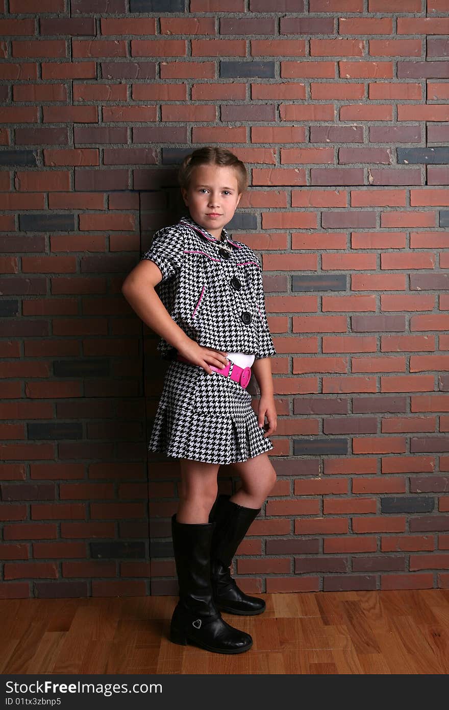 Young girl with cute stylish outfit